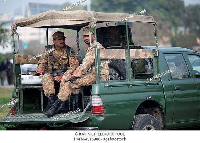 Pakistani soldiers secure the streets during the visit from German Minister of Defence Ursula von der Leyen and other high-ranking government representatives in...