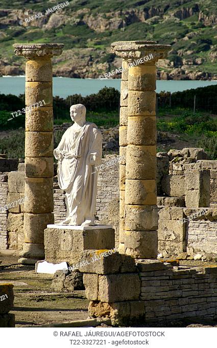 Tarifa (Cádiz) Spain. Columns and sculpture of Trajan in the Courthouse (judicial basilica) in the archaeological site of Baelo Claudia