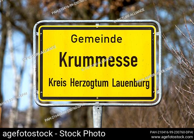 16 April 2021, Schleswig-Holstein, Krummesse: A place-name sign with the inscription ""Gemeinde Krummesse, Kreis Herzogtum Lauenburg"" stands at the entrance to...