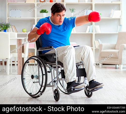 The disabled boxer at wheelchair recovering from injury