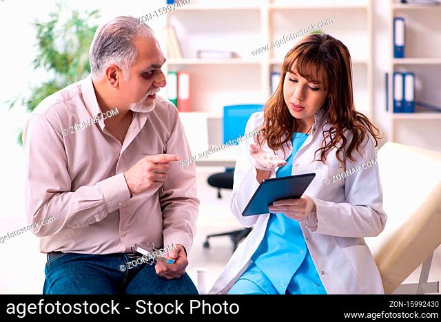 Old man visiting female doctor for plastic surgery