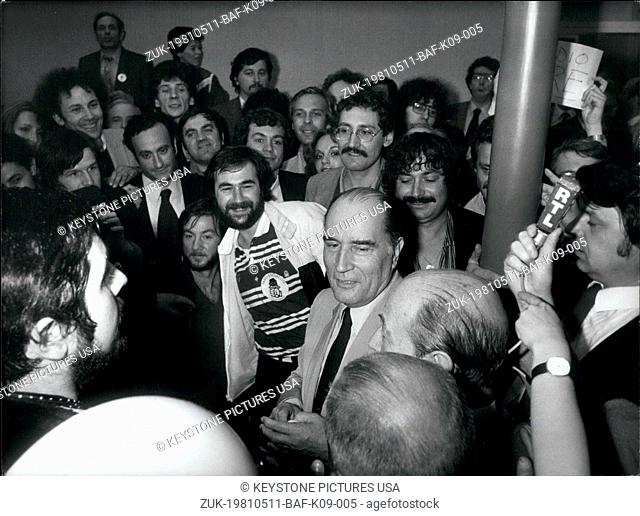 May 11, 1981 - Pierre Mauroy is behind Mitterrand. This was during the election in which Mitterrand was running for President