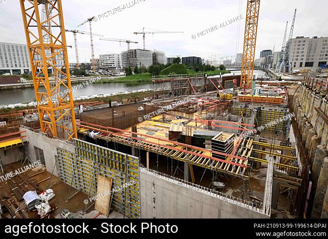 13 September 2021, Hamburg: View of part of the construction site at the symbolic laying of the foundation stone for the ""Roots"" wooden apartment building in...