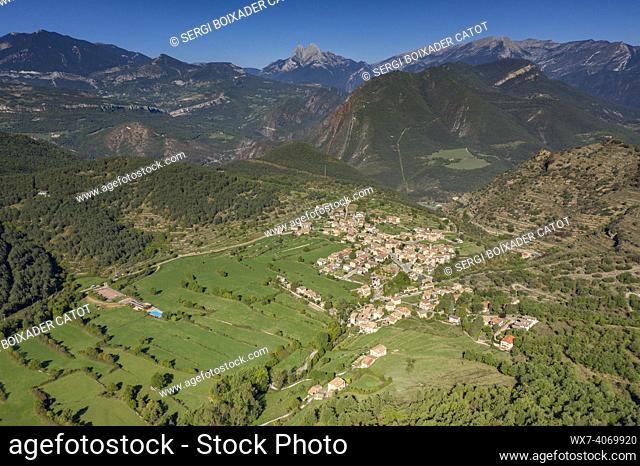 Aerial view of the town of Sant Juliá  de Cerdanyola and the Alt Berguedá  region. In the background, the Pedraforca massif (Berguedá , Barcelona, Catalonia