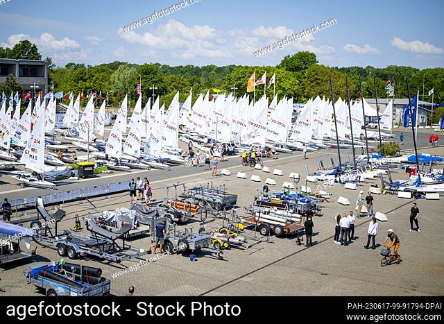 17 June 2023, Schleswig-Holstein, Kiel: Sailing: Kiel Week - Olympic classes. On the first day of competition, the harbor is already bustling with activity