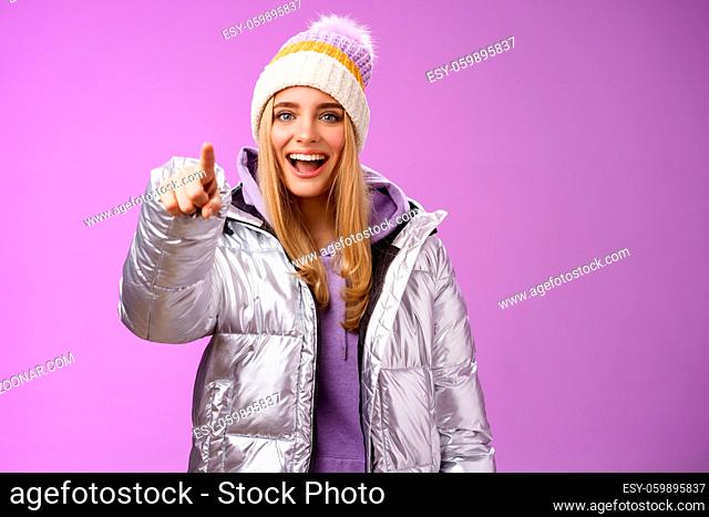 Girl make fun of clumsy friend pointing finger cruel ignorant laughing over funny amusing situation indicating camera standing happily mocking boyfriend
