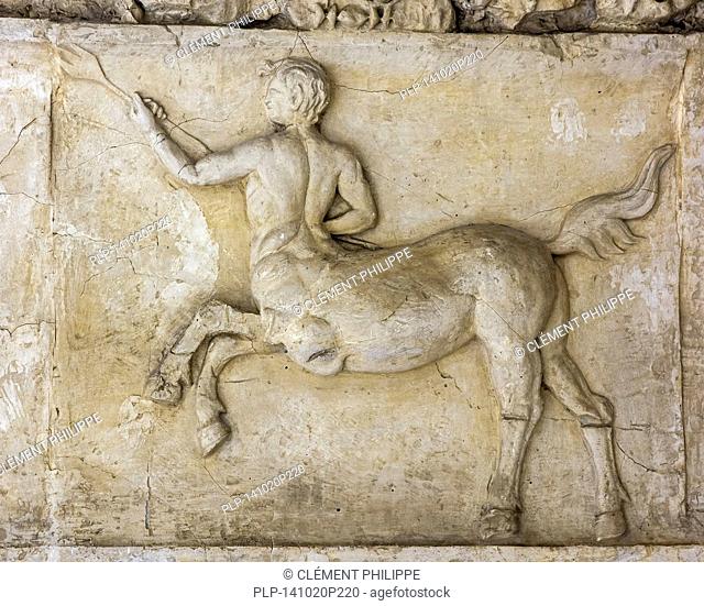Roman frieze showing centaur, mythological creature with the head, arms, and torso of a human and the body and legs of a horse