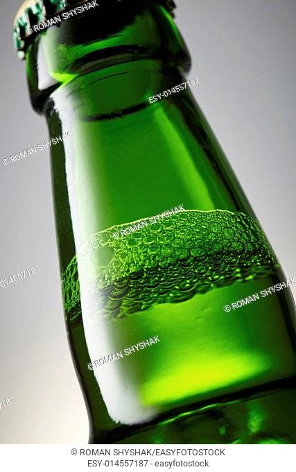 Green bottle of beer close-up