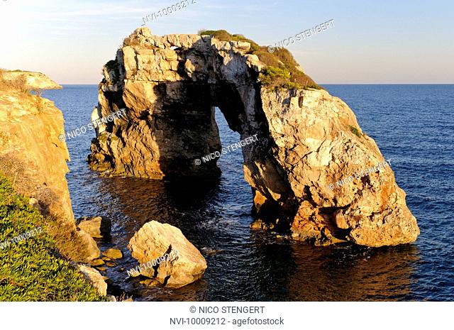 Es Pontas, a natural rock arch off the coast of Cala Santanyi, Majorca, Balearic Islands, Spain, Europe