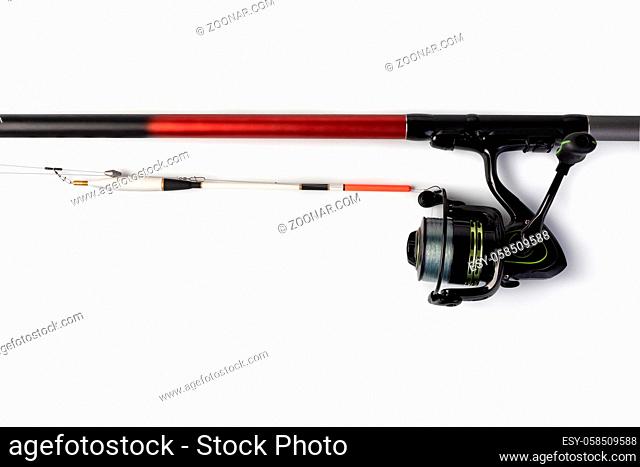 Fishing rod and reel isolated on white background