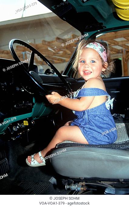 Little girl in the driver's seat in Los Angeles, California