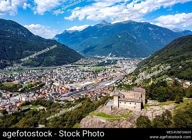 Switzerland, Ticino, Bellinzona, Aerial view of Sasso Corbaro castle overlooking town below