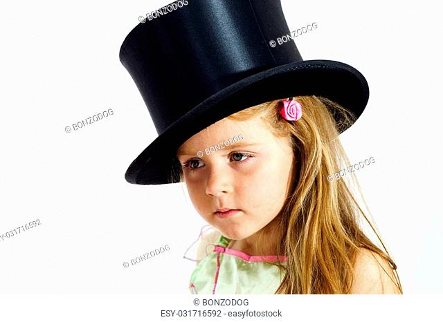 camouflage banner snigmord Little girl top hat Stock Photos and Images | agefotostock
