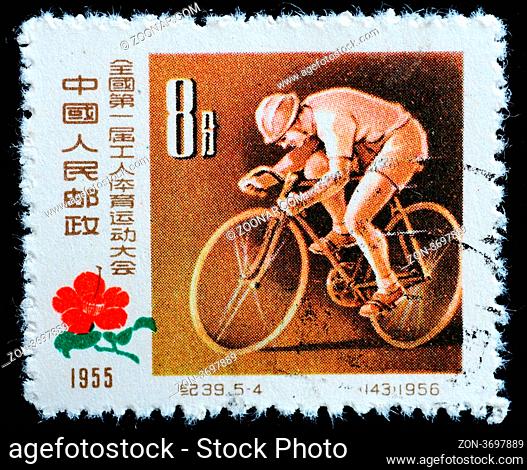 CHINA - CIRCA 1956: A Stamp printed in China shows image of a young cyclist at the First National Workers' Sports Games, circa 1956  CHINA - CIRCA 1956: A Stamp...