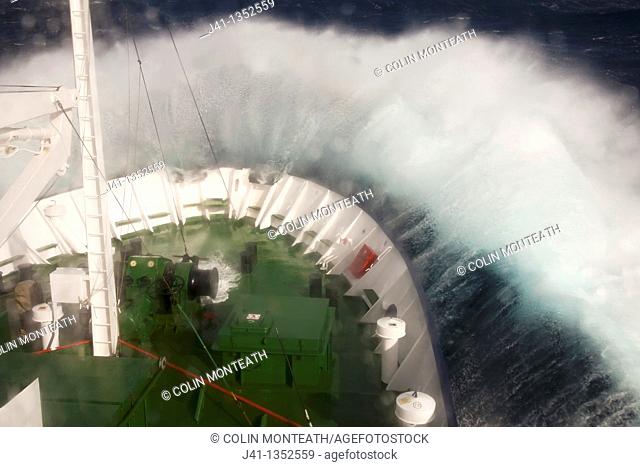 Wave crashes over ship's bow, Drake Passage near Antarctic Peninsula