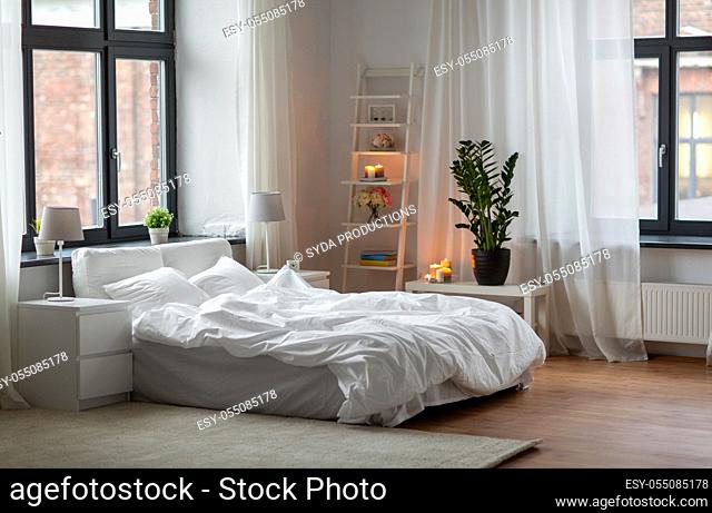 cozy bedroom with white linen on bed