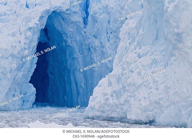 View of tidewater glacier cave found deep inside Neko Harbor on the western side of the Antarctic Peninsula, Southern Ocean