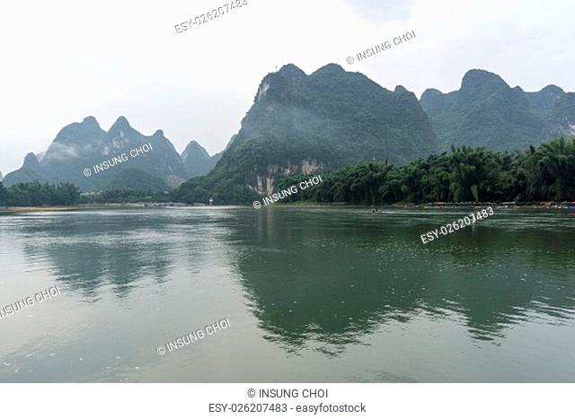the famous 20 yuan banknote scenery taken early in the morning when the li river is calm. Taken in xingping, guilin, china. During summer