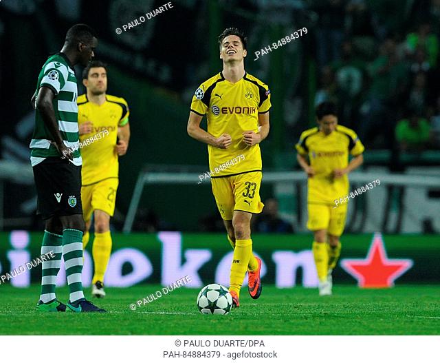 Julian Weigl of Borussia Dortmund celebrates after scoring his team second goal against of Sporting Lisbon during the UEFA Champions League Group F soccer match...