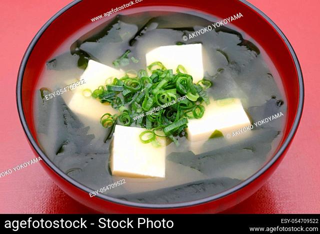 Japanese food, Miso soup of tofu and seaweed wakame in a bowl on table
