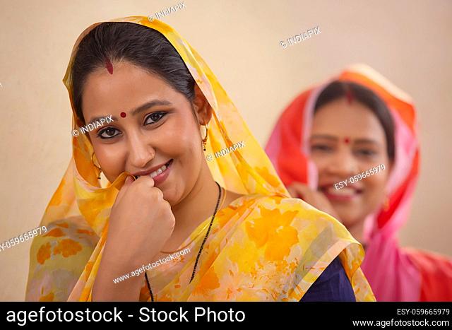 Two rural women smiling