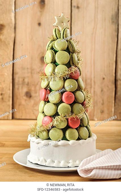 A Christmas pyramid cake made of pistachio and redcurrant macarons