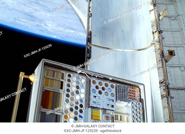 A close-up view of a Materials International Space Station Experiment (MISSE-6) on the exterior of the Columbus laboratory is featured in this image...