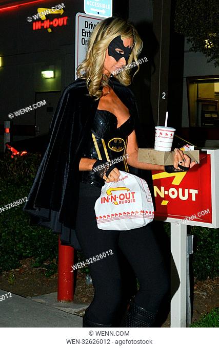 Lady Victoria Hervey makes a quick stop to get some 'In and Out' burgers in Hollywood dressed as Batman in between parties