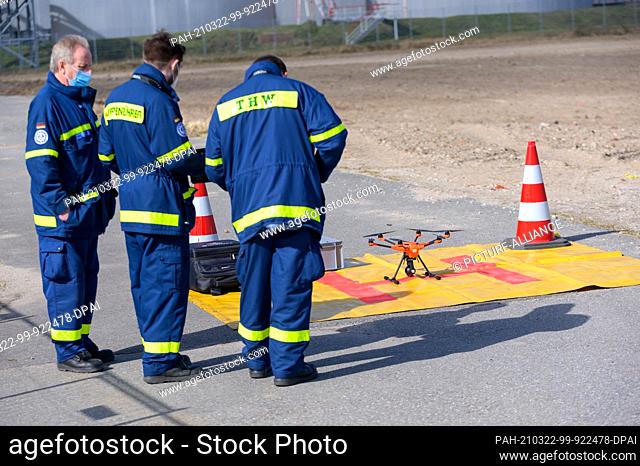 22 March 2021, Hamburg: THW (Technisches Hilfswerk) drone pilots prepare their aircraft. The Hamburg police have been searching with a large contingent for a...