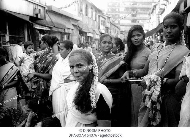 Devdasi celebrating Yellamma festival procession at Kamathipura ; Bombay Mumbai ; Maharashtra ; India NO MR