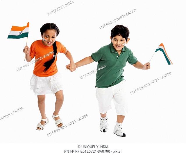 Children holding Indian flags