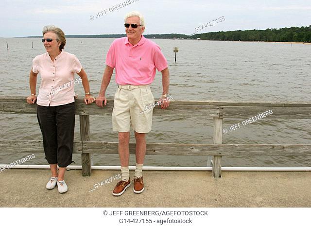 Senior couple. Mobile Bay, Municipal Park Pier, Fairhope. Alabama. USA