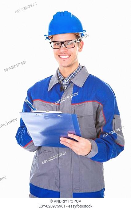 Male Construction Reviewer Holding Pen And Clipboard