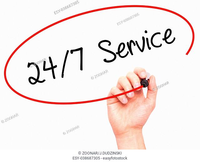Man Hand writing 24/7 Service with black marker on visual screen