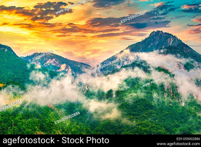 Sunset fog in great mountains of Montenegro