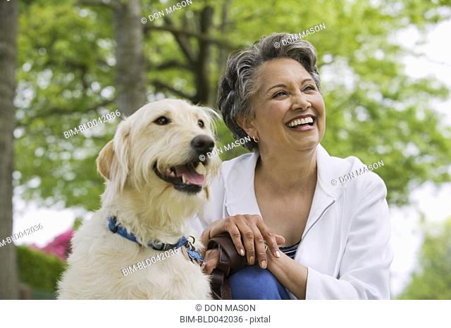 African American woman with dog