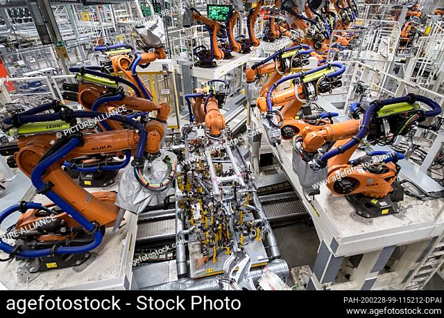 25 February 2020, Saxony, Zwickau: Parts for the new VW ID.3 run through a fully automated production line in the body shop of the Volkswagen plant in Zwickau
