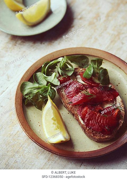 Beetroot cured salmon on toasted sourdough