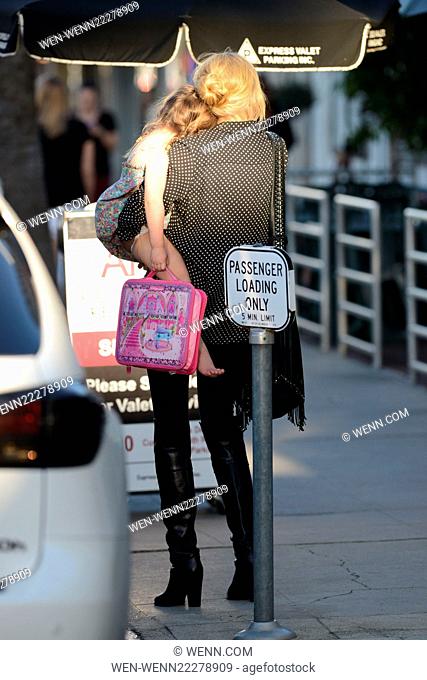 Kimberly Stewart shoots a new reality show and carries daughter Delilah del Toro to the car Featuring: Kimberly Stewart, Delilah del Toro Where: Los Angeles