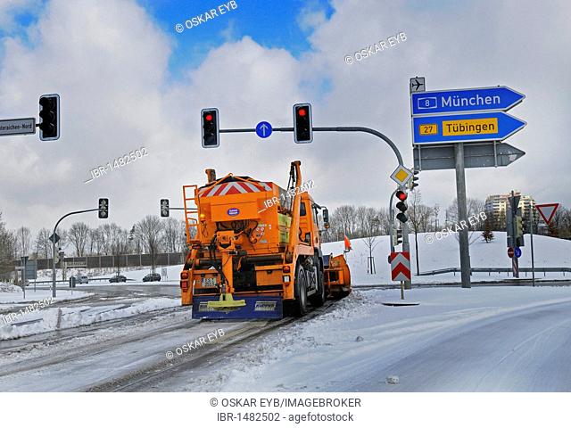 Onset of winter, winter service gritter vehicles on the motorway turning lane in Leinfelden, Baden-Wuerttemberg, Germany, Europe