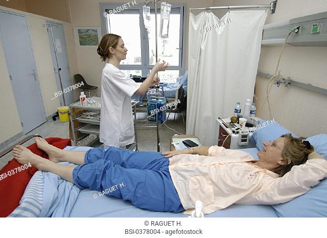 WOMAN HOSPITAL PATIENT WITH NURSE<BR>Photo essay from hospital. Patient and nurse.<BR>Institut Gustave-Roussy, in the French region of Ile-de-France