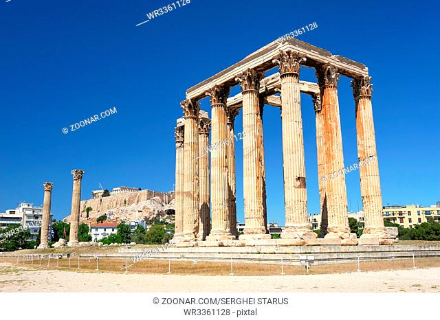 Olympeion, Ancient Temple of Olympian Zeus. Athens Greece. Acropolis at background