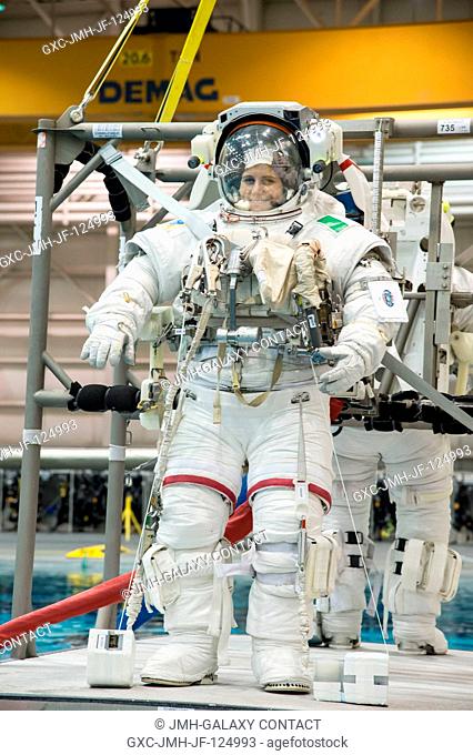 European Space Agency astronaut Samantha Cristoforetti, Expedition 4243 flight engineer, attired in a training version of her Extravehicular Mobility Unit (EMU)...