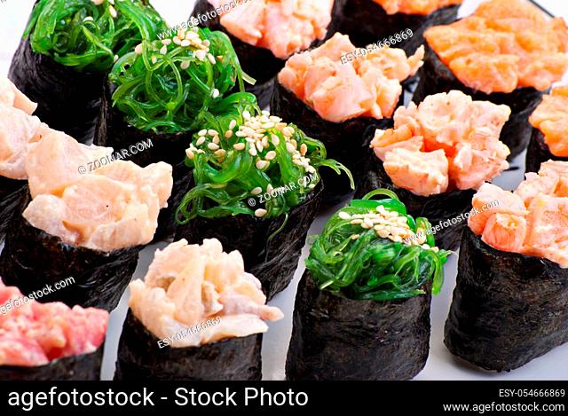 Traditional Japanese food Sushi. Closeup japanese sushi on a white plate. Sushi set