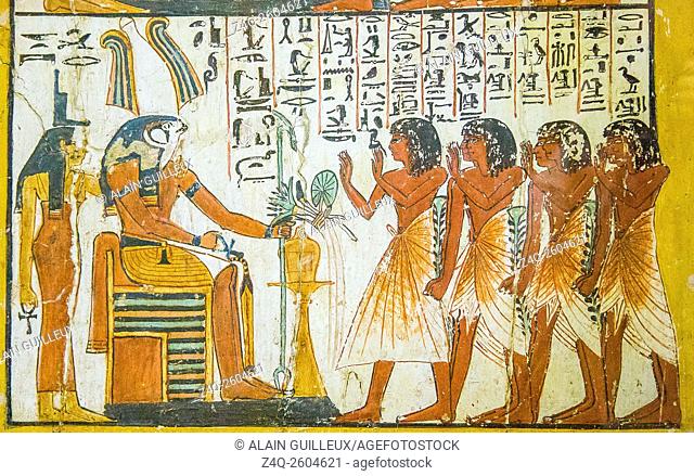 Egypt, Cairo, Egyptian Museum, from the tomb of Sennedjem, Deir el Medina : Door panel (verso), bottom register, Sennedjem family worships Ptah-Sokar-Osiris and...