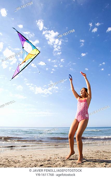 girl flying a kite