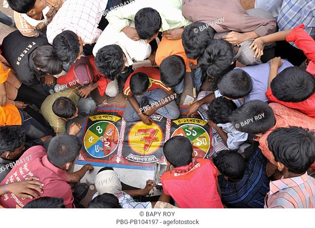 People participate lucky games at Boishaki Mela due to Bangla New Year Noboborsha or the Bangla New Year celebrates by all Bangladeshis annually People wear...
