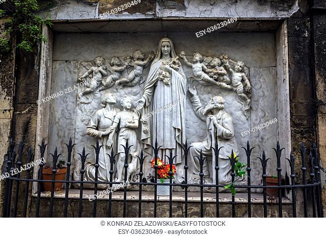 Relief in front of Chiesa di Santa Teresa del Bambin Gesu (Saint Therese of Child Jesus church) in Catania city, east side of Sicily Island, Italy