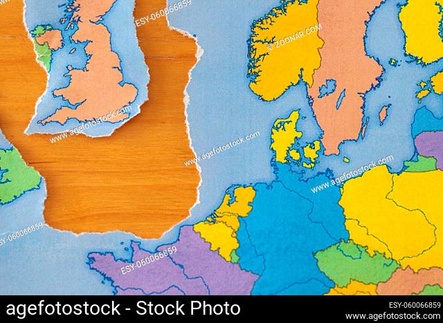 a torn paper map symbolizing the UK leaving the European Union or Brexit