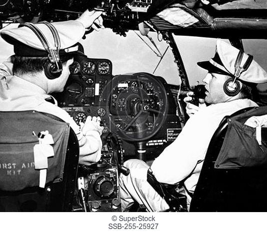 Pilot and a co-pilot preparing for take off